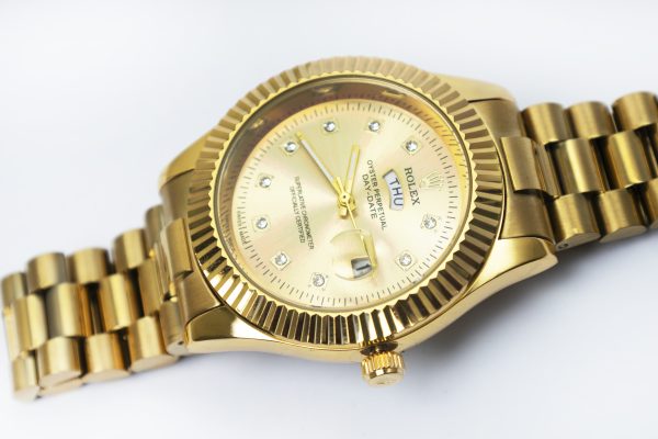 Regal Gold-Tone Fluted Bezel Watch